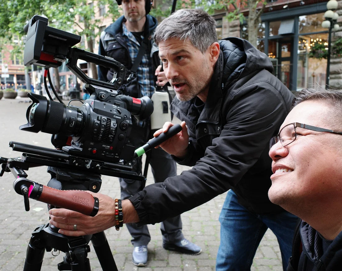 Steve Hyde working with a collaborator on location